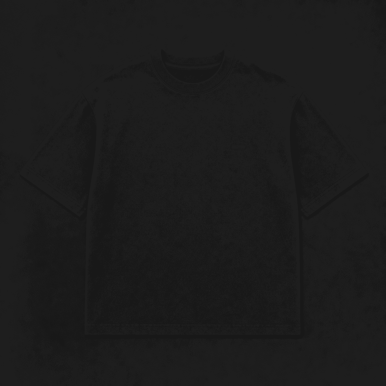 Black oversized t-shirt laid flat for size measurements